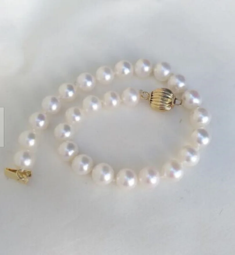 

Beautiful 6-7mm circular AAA South China Sea white pearl bracelet 7.5-8 inches 14k gold P