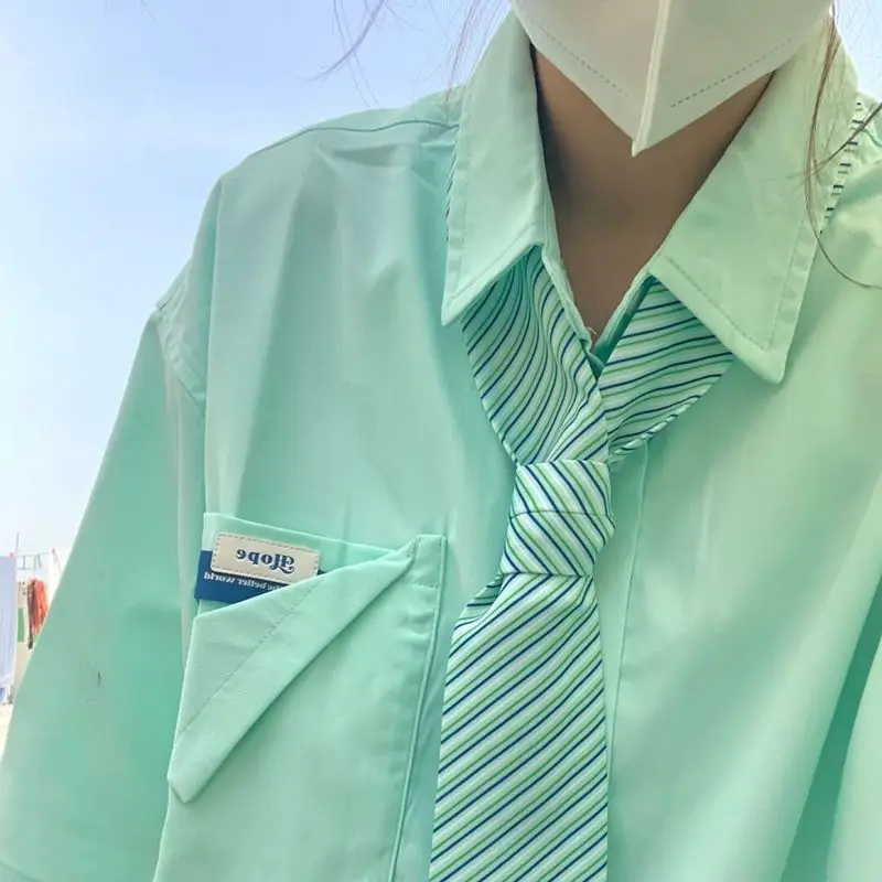 

2024 new couples college style Japanese style fresh tie shirts for men and women trendy summer large size loose casual tops y2k