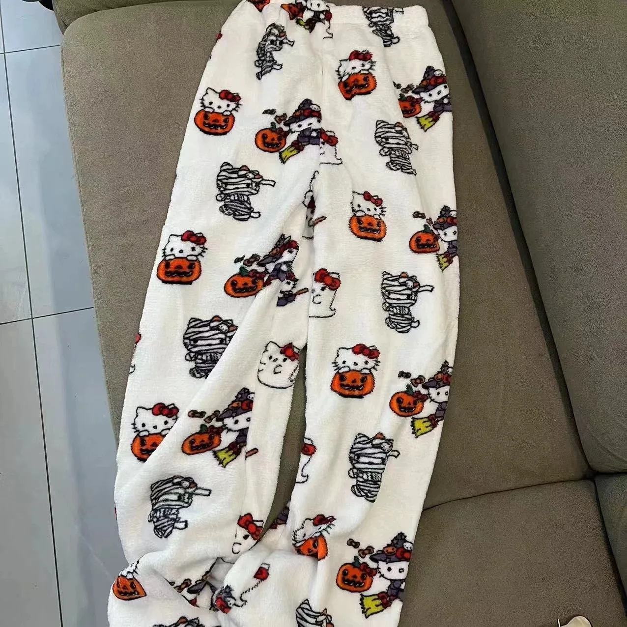 Christmas Hello Kitty pajama pants, loose anime-style loungewear trousers for women, cute cartoon couple sleepwear from CyberStreetOne.com beige