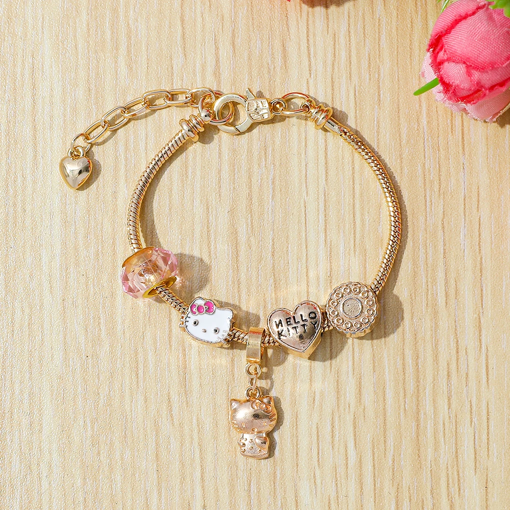 سوار "هيلينا" المطلي بالذهب مع تعليقات "هالو كيتي"...