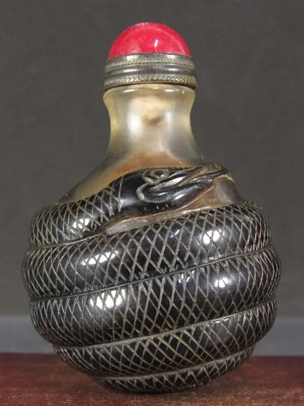 

Chinese Snake Carved Peking Overlay Glass Snuff Bottle
