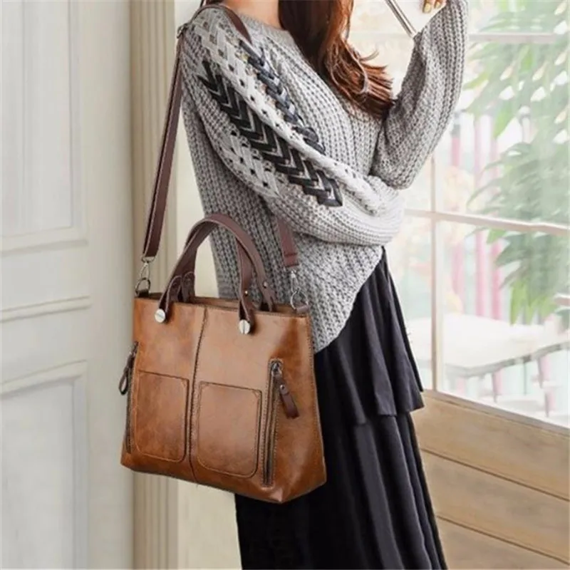 Retro leather handbag with two zipper pockets, versatile tote and crossbody style, classic women’s work and business bag.32651