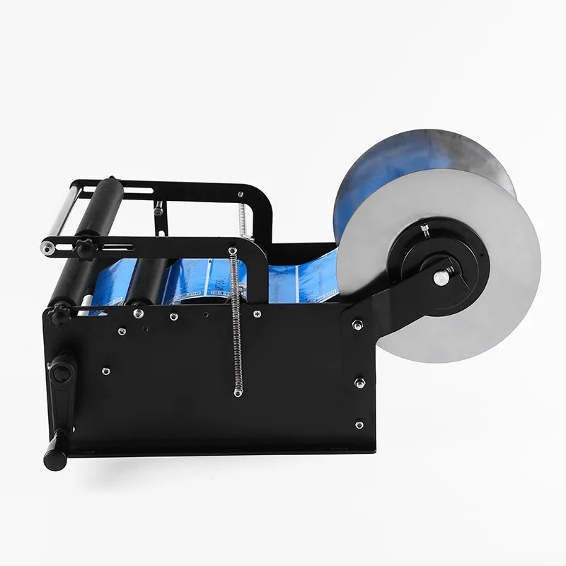 DN-MT-40 수동 원형 병 라벨링 기계, 투명 자체 접착 라벨링 기계, 작고 간단한