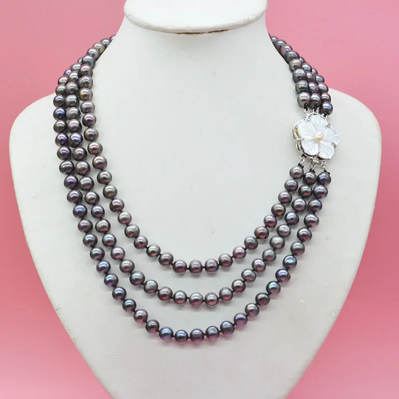 

The most classic wedding necklace. 3 rows of 8MM AA natural freshwater baroque pearls. white/pink/black options 18-23"