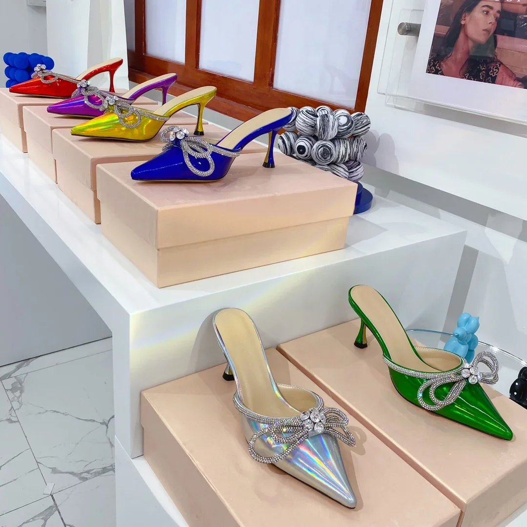 

Mach Double Bow iridescent leather Mules crystal-embellished bow Pointed toe Slip-on Knot Rhinestone High Heel PVC Slippers