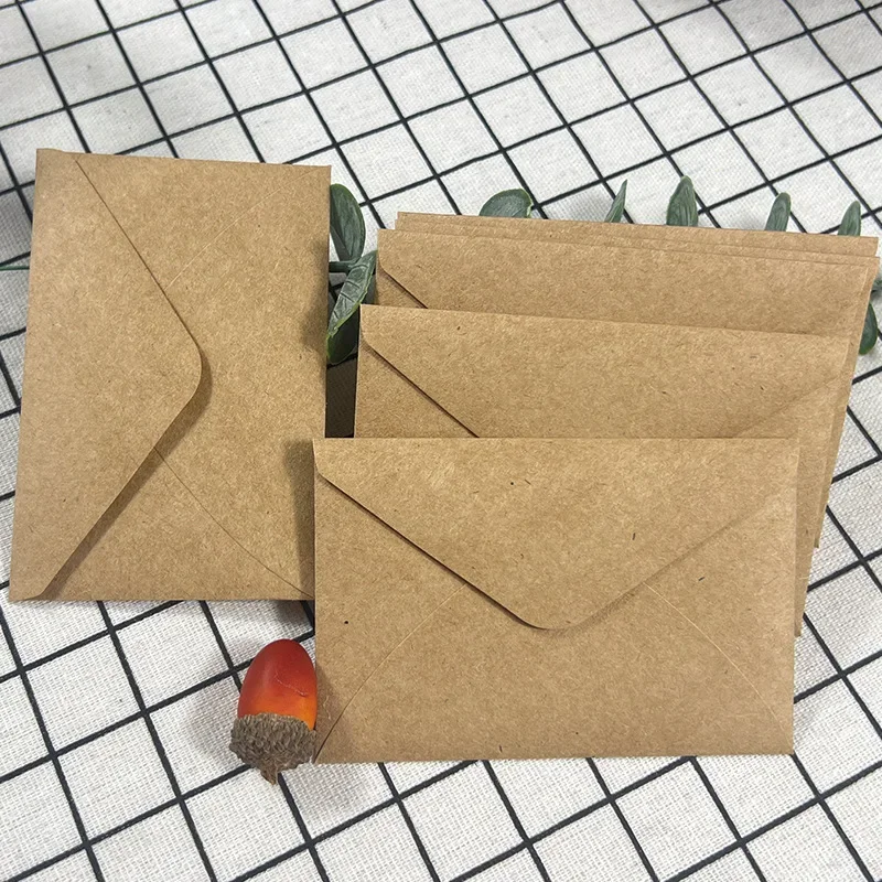 50pcs Kraft Brown Paper Envelopes 105x155mm Wedding Invitations Business Supplie Postcard Giftbox Packaging Storage Stationery