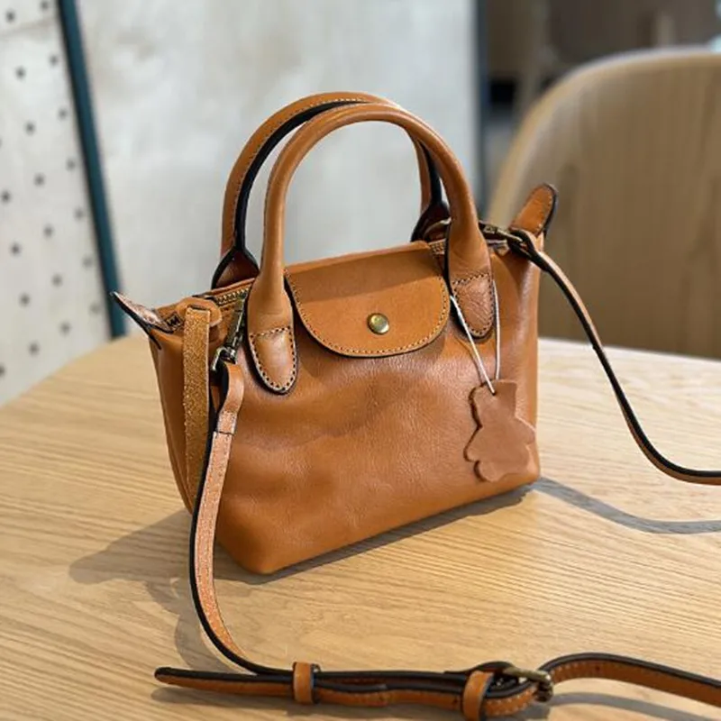 

2024 Spring/Summer vegetable tanned cow leather women's Bag Hand Bill Shoulder Bag Leather casual fashion mini crossbody bag