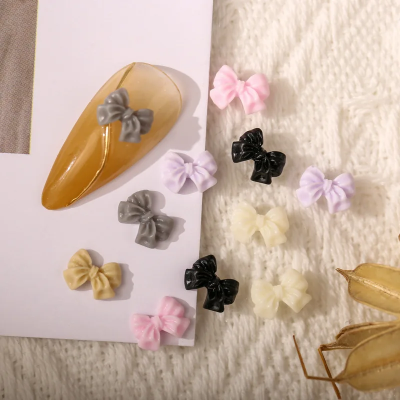 50PCS 미니 3D 아크릴 네일 아트 보우 매력 액세서리 가짜 손톱 장식 용품에 대 한 귀여운 수 지 Bowknot 매니큐어 재료