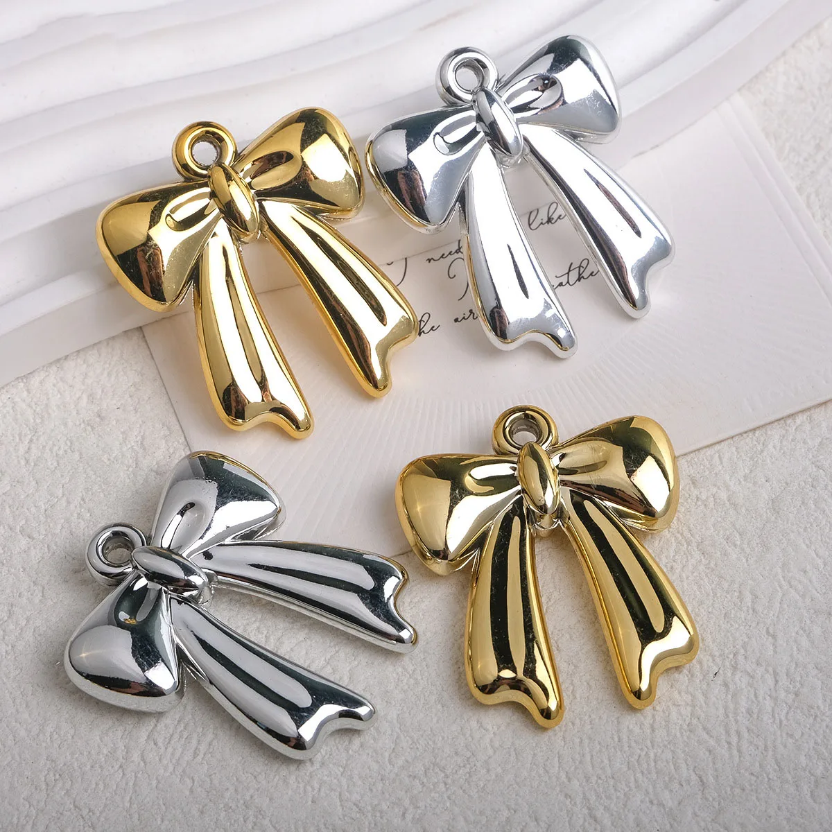 

DIY Jewelry Findings Bright UV Coated Colors Ribbon Knot Tie Bow Necklace Charms Ornament Accessories Necklace Pendant31*34mm