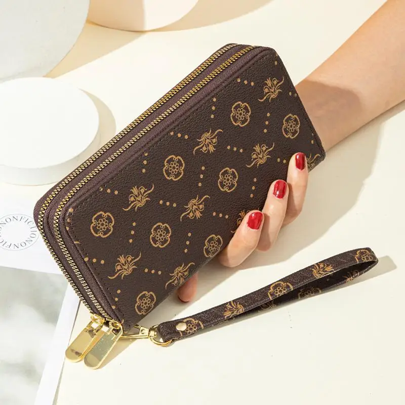 Printed Louis Vuitton dual zipper bags