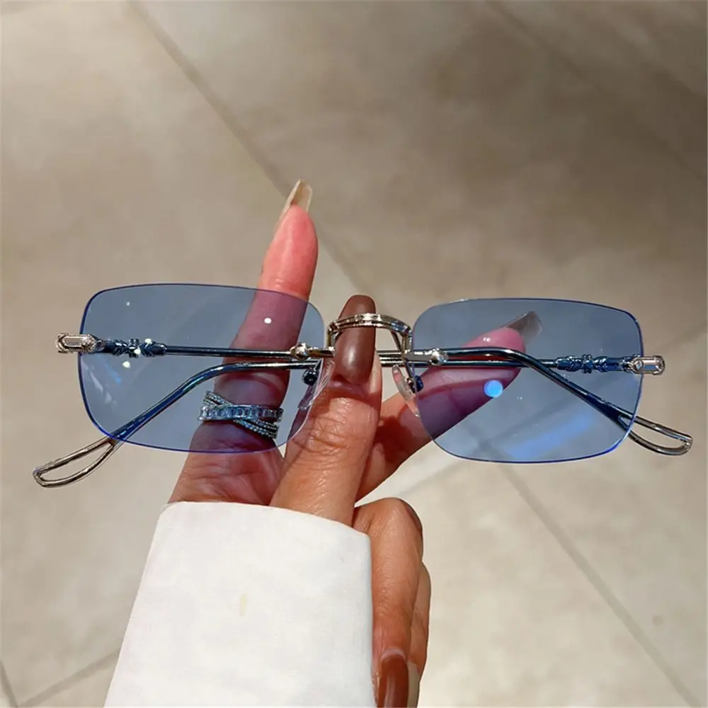 Sleek Unisex Rimless Metal Sunglasses with UV400 Ocean Lenses