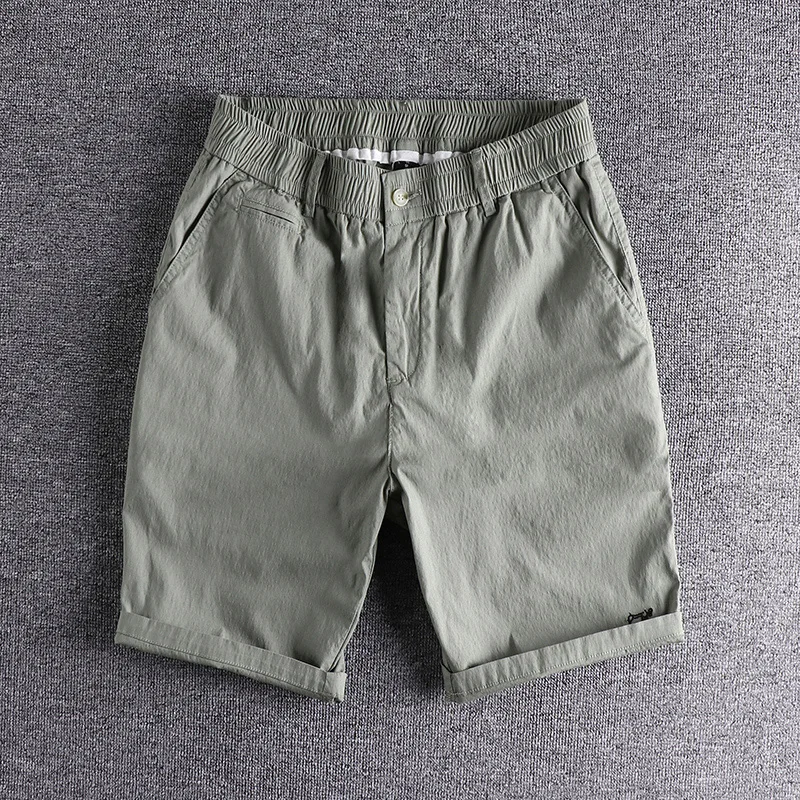 

Breathable, washable and comfortable summer thin men's casual shorts trend solid color loose youth quarter pants
