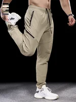 Pantalon de sport décontracté pour hommes, séchage rapide, vêtements d'entraînement, de course, de Fitness, avec poche à fermeture éclair micro-élastique, nouvelle collection automne hiver 2