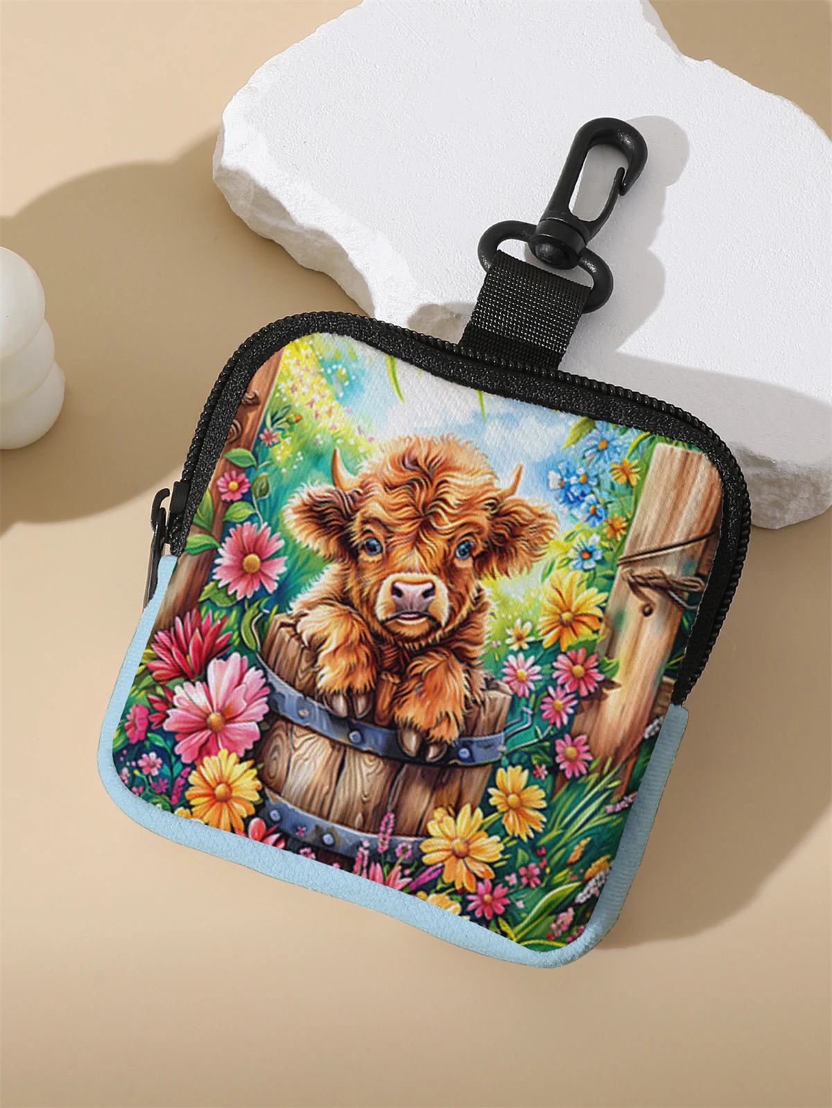 A large capacity coin wallet with a cow pattern, a digital printed coin wallet, and a storage bag are ideal choices for gifs