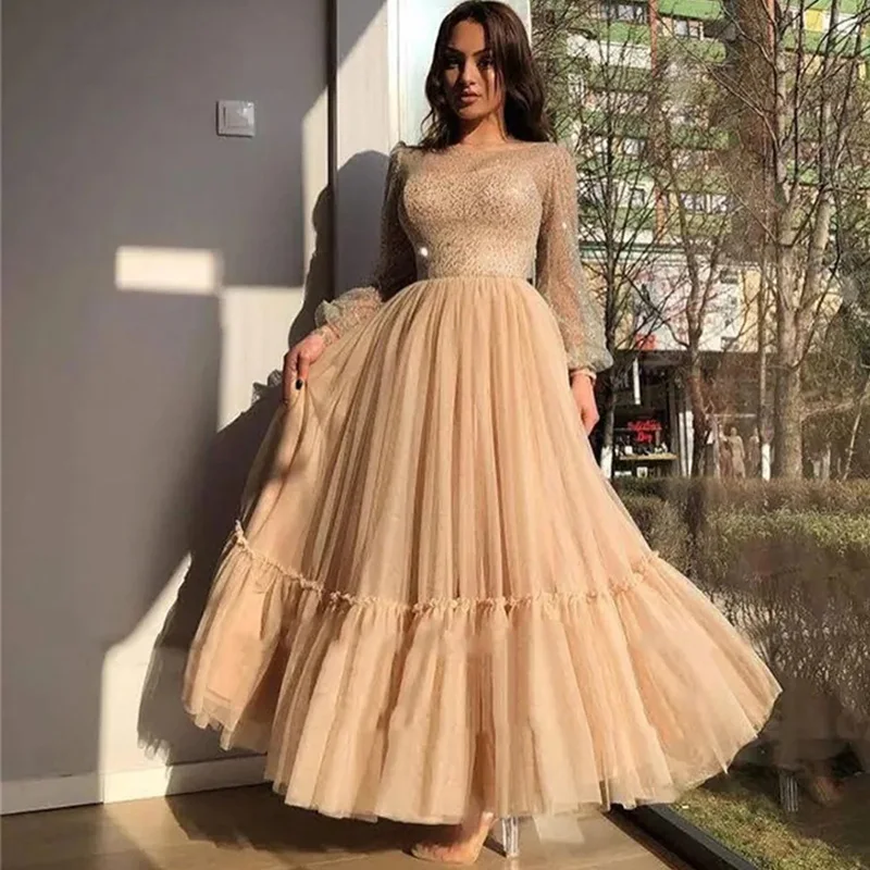 

Musetta Modest Champagne A Line Tulle Prom Dresses Sparkly Long Sleeves Sheer Scoop Neck Ankle Length Formal Evening Gowns