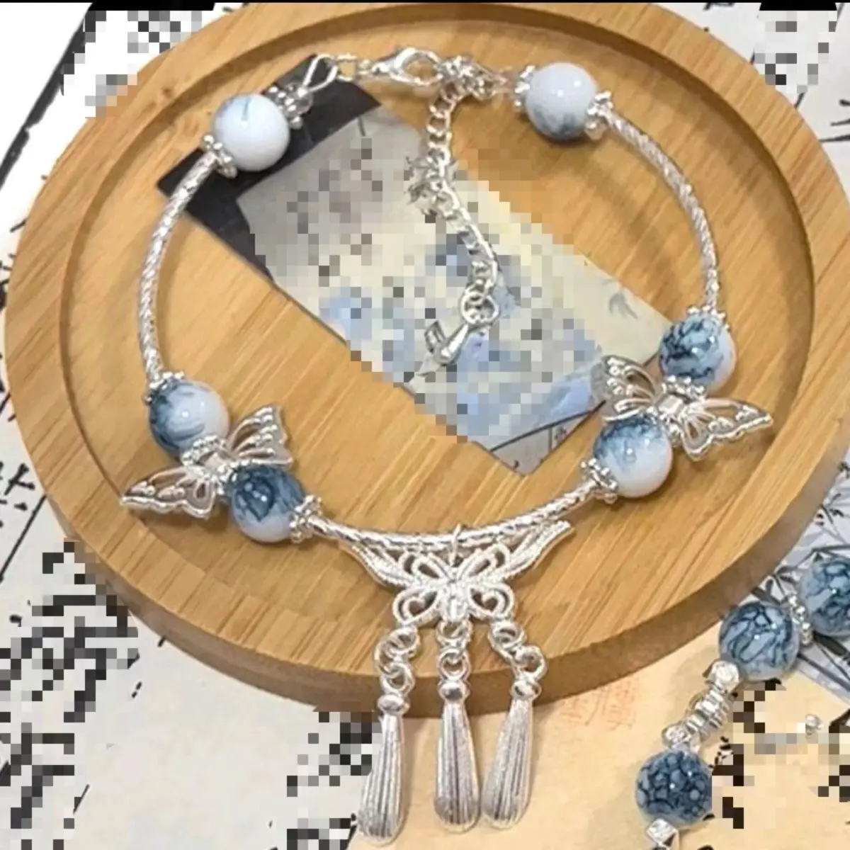 Populaire blauw en wit porselein kleur bijpassende oude stijl vlinder kwastje armband voor dames nieuw Chinees ontwerp Ping An merk voor dames_voghion.com