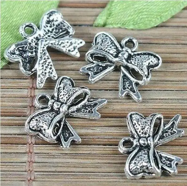 

30pcs 10.7*12mm tibetan silver color butterfly knot design charms EF0218