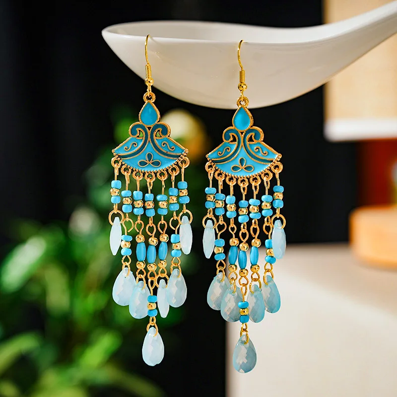 orecchini con piume ,boho con perle di stoffa - Gioielli - Orecchin