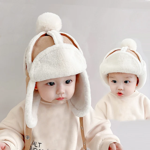 귀엽고 편안한 모자로 아이를 추위로 보호합니다.