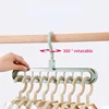 2Pcs/4Pcs  9-in-1 Multifunctional Foldable Reusable Hanger Storage Rack Nine Hole Plastic Hanger For Household Garments 1