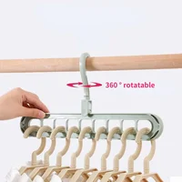 2Pcs/4Pcs  9-in-1 Multifunctional Foldable Reusable Hanger Storage Rack Nine Hole Plastic Hanger For Household Garments 1