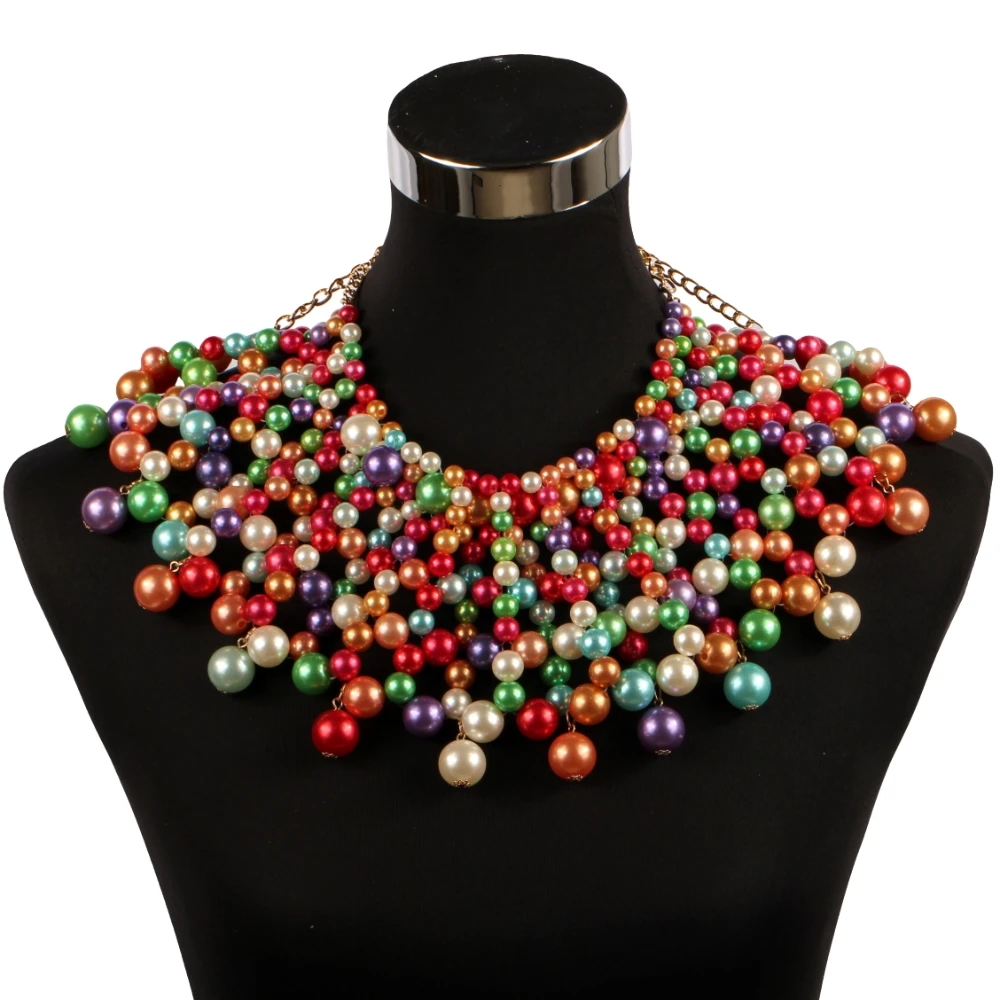 Collier bohème boho chic avec pompons roses et violets