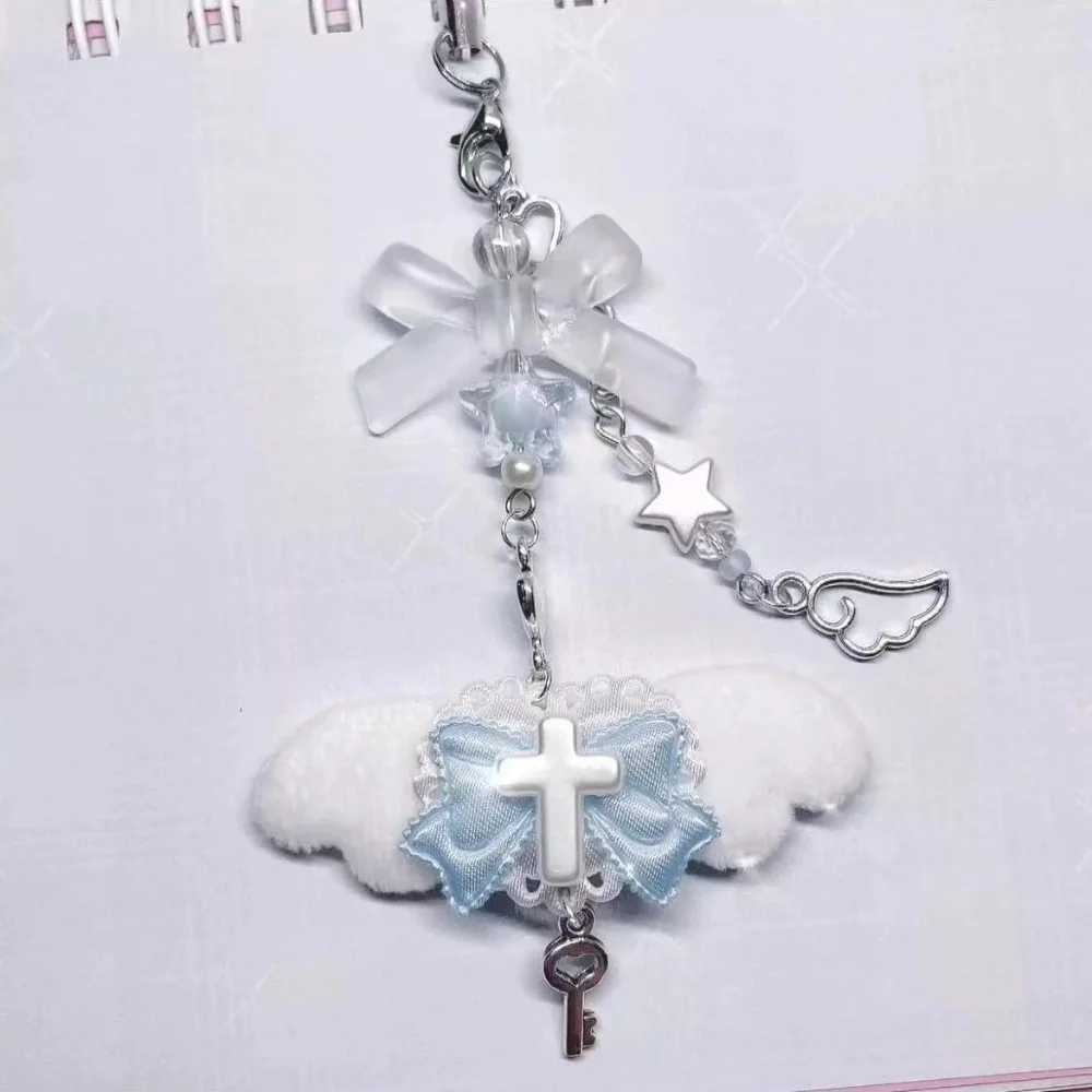 Bow and wings pendant phone chain detail