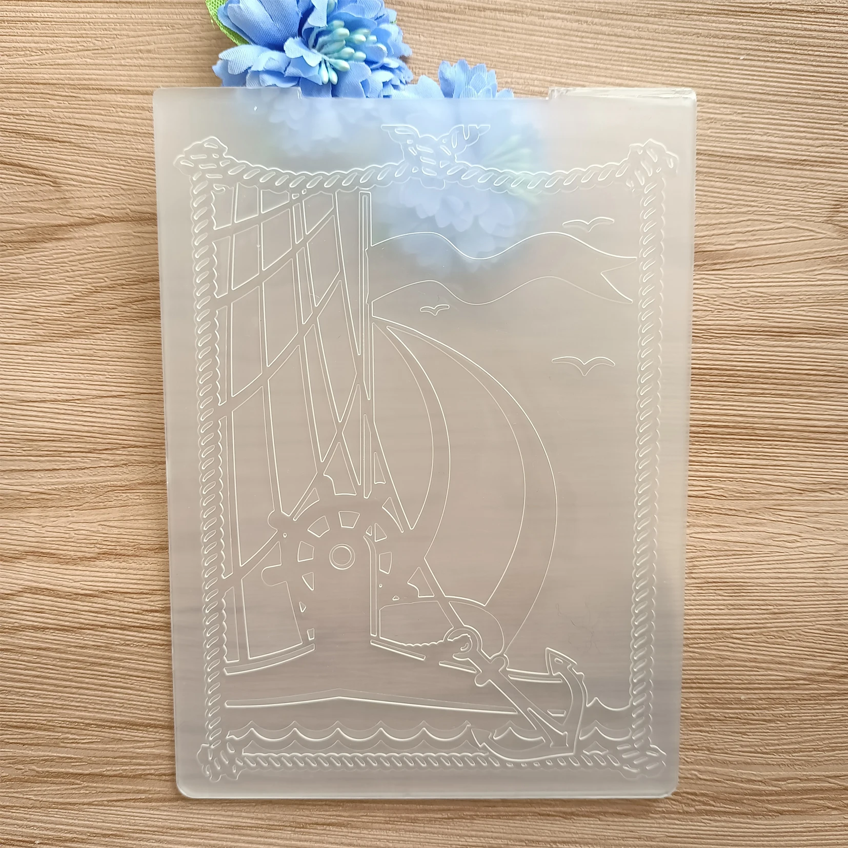 https://ae01.alicdn.com/kf/S1cbf72ee90904f4b89936cbeb7277cdfi/Sailboat-At-Sea-Embossing-Folder-For-Scrapbooking-DIY-Photo-Album-Card-Making-Crafts.jpg