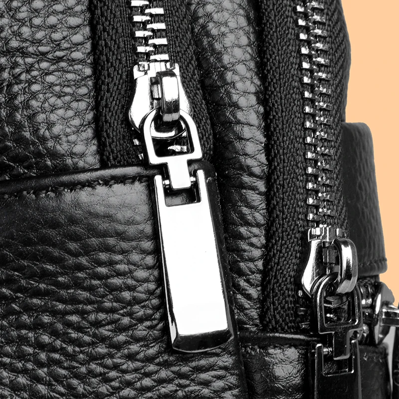 Stylish genuine leather sling bag for men with multiple compartments, ideal for everyday carry or travel