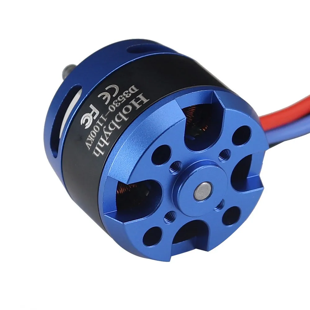 Moteur électrique sans balais D3530 1100KV pour avion RC posé sur une surface, avec une hélice à proximité.