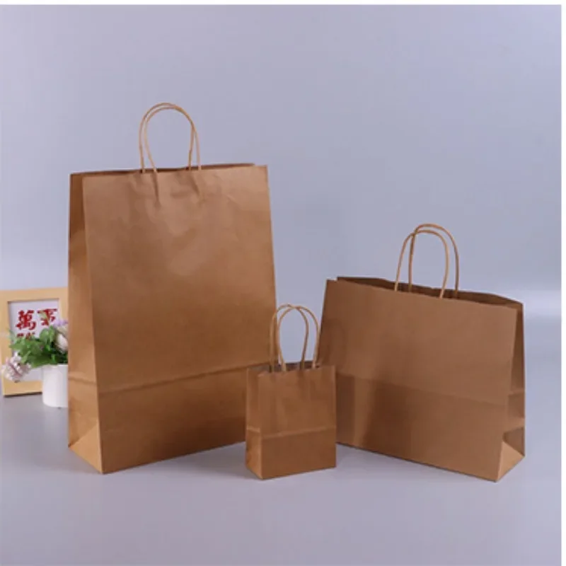 thumbnail image 1 of Bolsas de regalo de papel Kraft con asas, 10/20/30/50 unidades, para compras, manualidades, color marrón y blanco, para fiestas, suministros navideños, 1 of 5