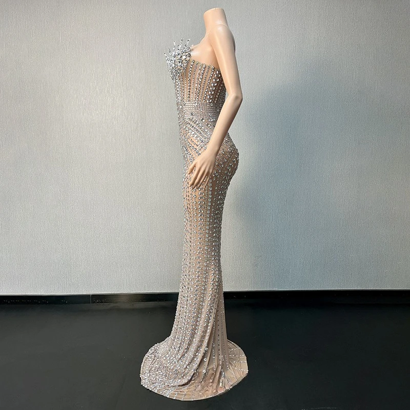 jlo silver sequin dress The iconic @jlo wearing our JLo Cross Diamond Gown at the @amas., , Originally unveiled as the opening look during the La Bohme Fall/Winter 2023 runway show, this gown was conceived as a tribute to
