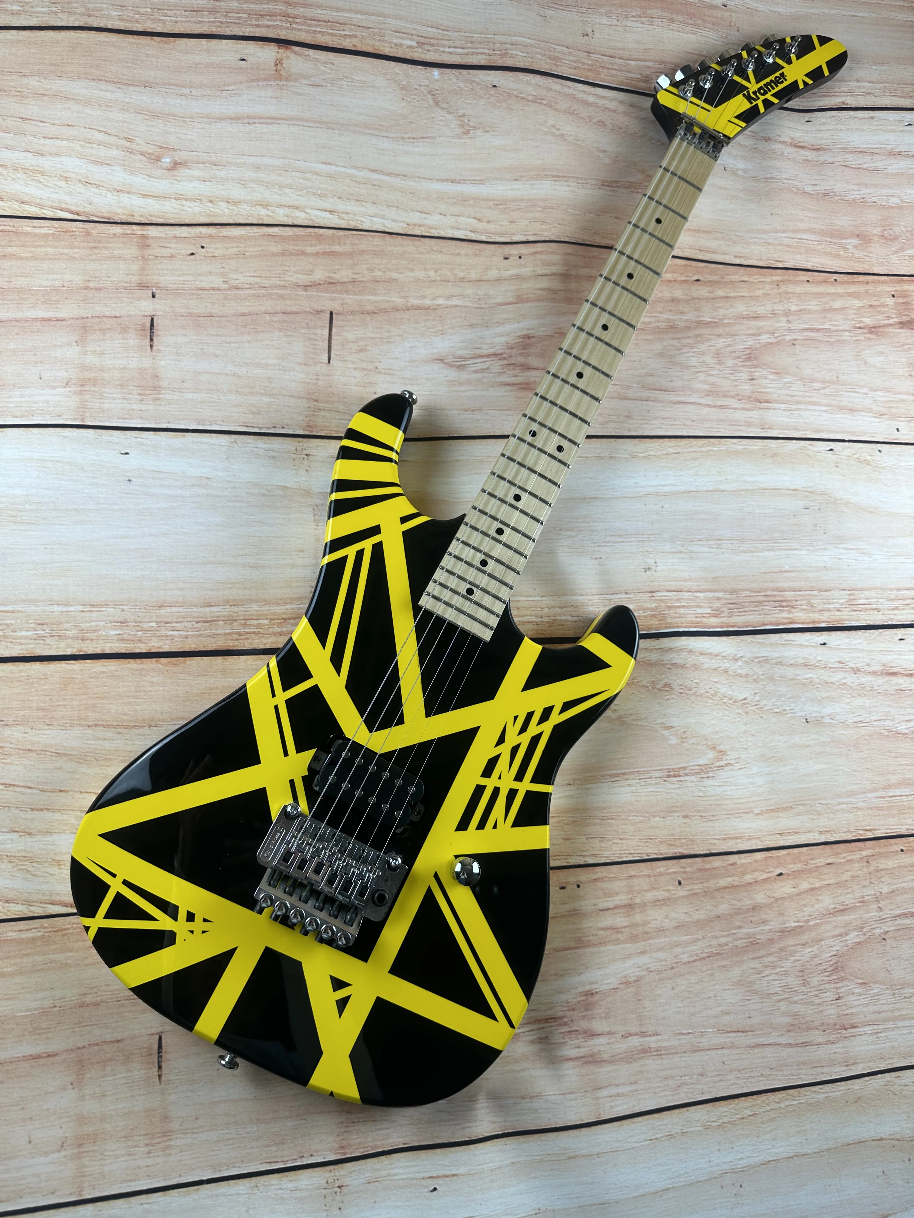 

5150 electric guitar, imported alder body, Canadian maple fingerboard, signed, classic yello and white stripes, lightning packag