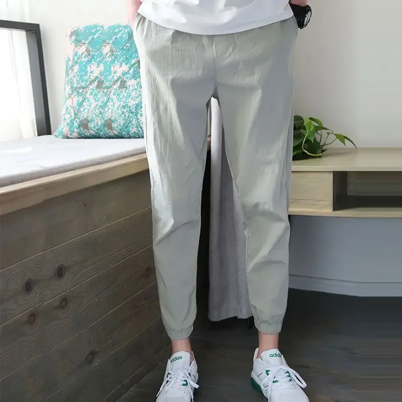 thumbnail image 1 of Pantalones casuales blancos rotos de tendencia para hombre, pantalones ajustados de moda para hombre, novedad en ropa de calle holgada, elegante, de algodón con bolsillos anchos, 1 of 5