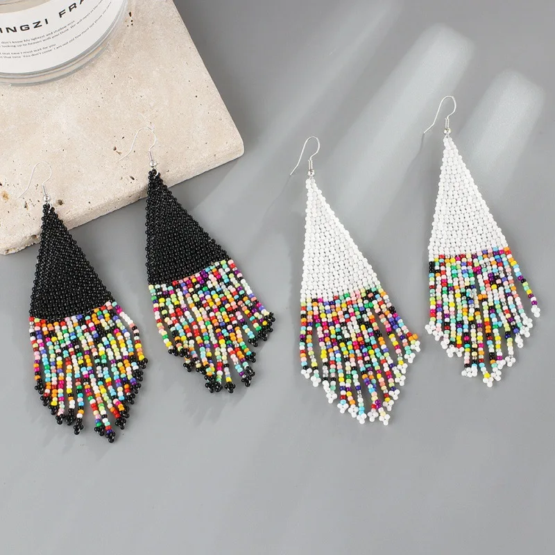 

Rice Bead Earrings Hand weaving Beaded Pearl rice Simplicity Retro Bohemia geometry alloy ma'am Tassel Earrings