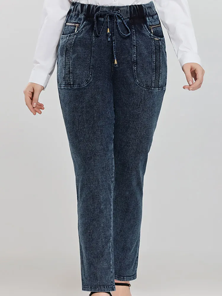 بالإضافة إلى حجم المرأة عارضة الجينز عالية الخصر سليم صالح مريح تمتد الدينيم السراويل لحجم زائد