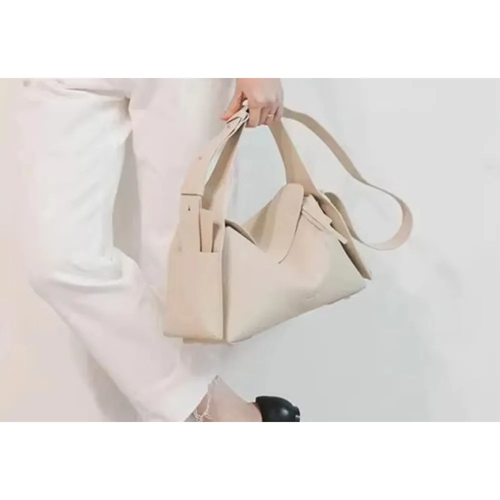 Songmont Mountain ha una serie di mini gronde con orecchie pendenti in pino, una borsa a tracolla portatile alla moda e versatile per i pendolari_voghion.com