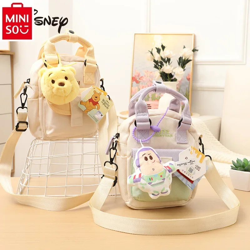 MINISO Disney Cartoon Bear Embroidered Lightyear Doll Pendant Student Multi functional Fashion Canvas Handheld Crossbody Bag