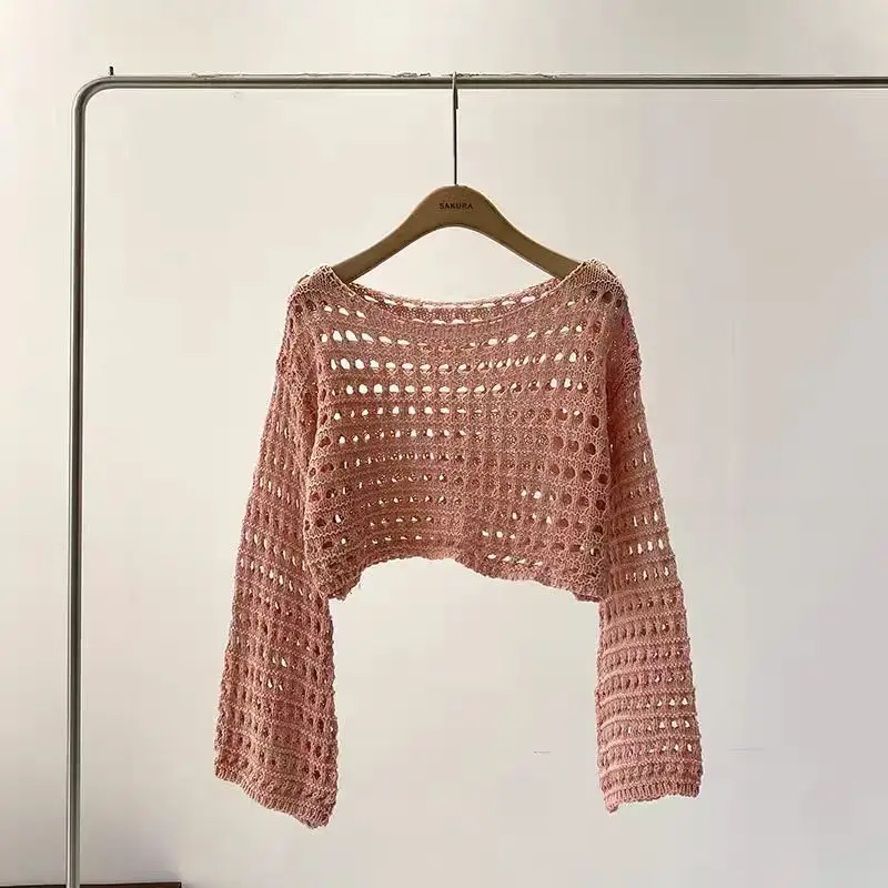 Spring and summer new French short long-sleeved hollow knitted sweater women's design sense thin sunscreen blouse top