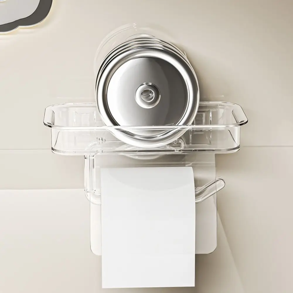 Suction cup toilet paper holder in transparent small size on bathroom wall