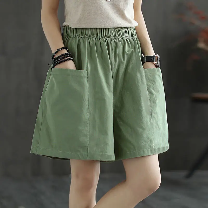 цена Fashion Elastic Spliced Pockets Solid Color All-match High Waist Shorts Women's Clothing 2024 Summer New Loose Casual Shorts