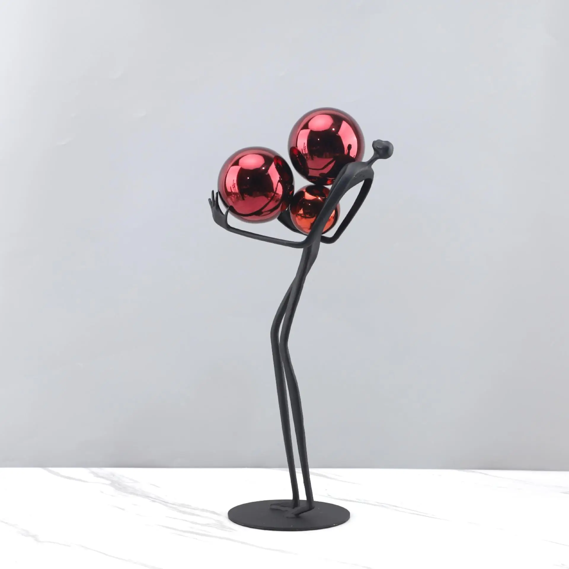 Men's Black Minimalist Desktop Sculpture with Gold Ball Accents