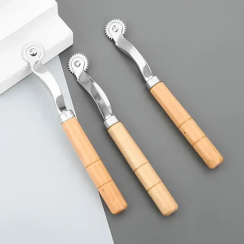 

Wooden handle crimping wheel plastic spacing wheel sharp tooth marking wheel non-woven crimping wheel tailor tracing wheel
