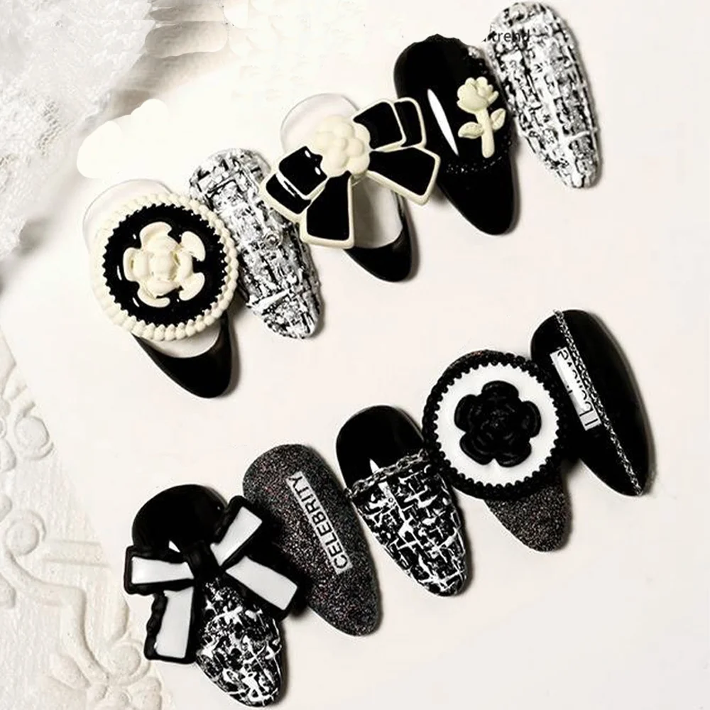 10pcs 블랙 화이트 Bowknot 네일 아트 매력 꽃 네일 라인 석과 3D 프랑스어 고급스러운 금속 합금 활 DIY 네일 액세서리