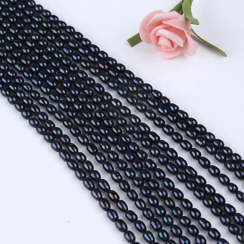 

4-5mm dyed black rice shape pearl in strand loose wholesale freshwater pearls beads