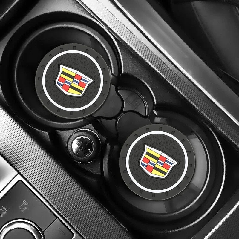 Set van twee stuks zwarte auto onderzetters met logo