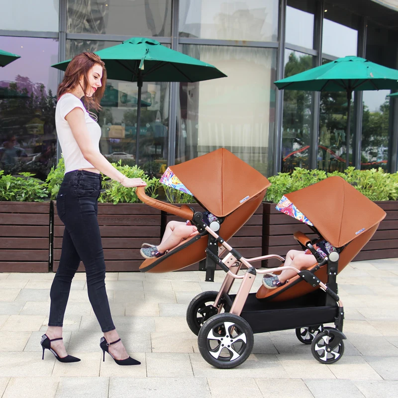 New Luxury twins baby stroller,aluminum frame PU leather twin pram,baby can sit and lying,double baby stroller carriage