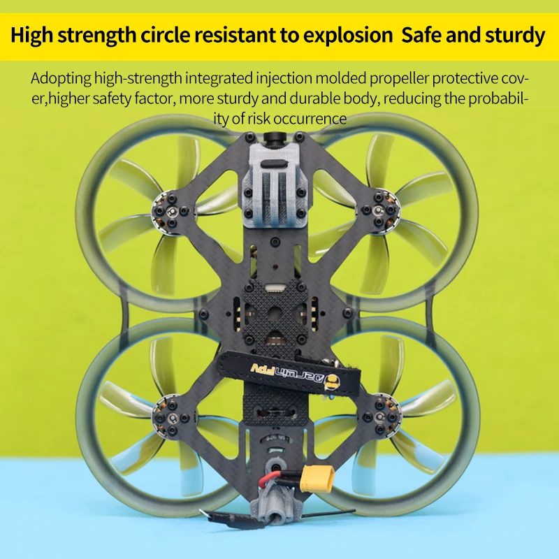 Kit FPV Analogique PNP jaune, détail du support de caméra et des moteurs.