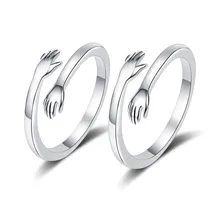Nowy produkt bankietowy wyjątkowo kreatywne miłość przytulić para pierścień Plated 925 srebrny pierścień proste męskie i żeńskie biżuteria dla uczniów tanie i dobre opinie CN (pochodzenie) Miedziane Kobiety Metal TRENDY Obrączki ślubne moda Na imprezę Pierścionki