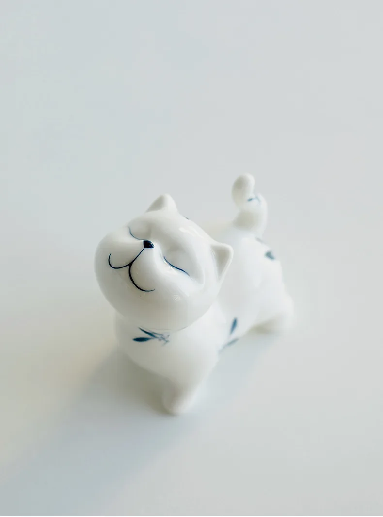 Description Picture 6 of itemCreative Hand-painted Butterfly Orchid Ceramic Tea Pet White Porcelain Haughty Cat Ornaments Lovely Tea Play Table Decorations